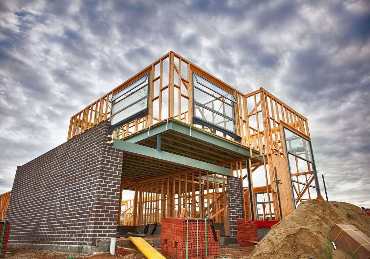 A building under construction with some wood framing.